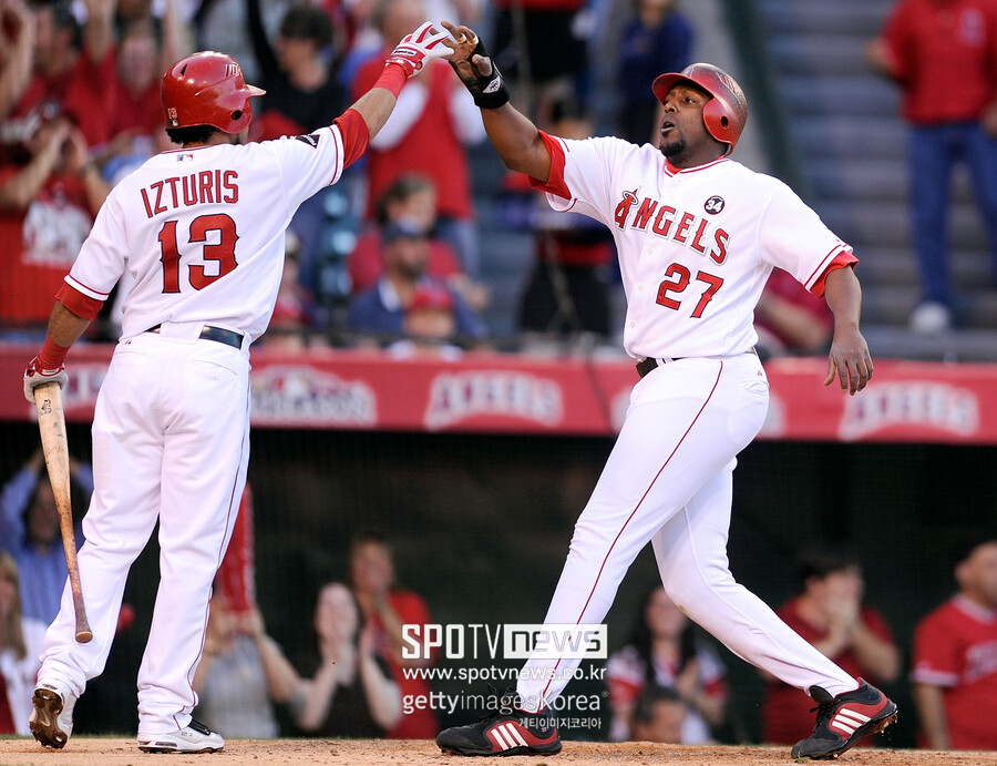 ▲ 메이서 이투리스(왼쪽)와 블라디미르 게레로.