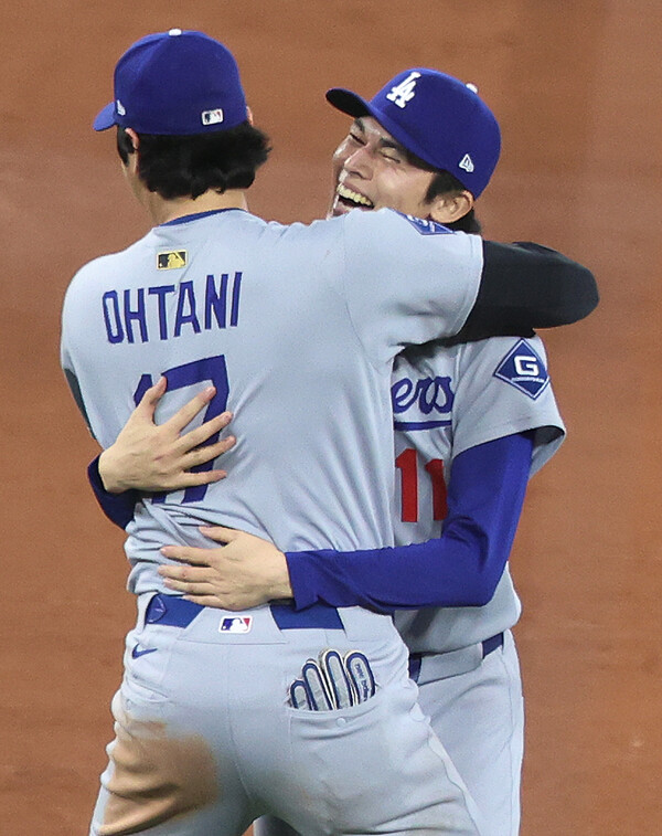 ▲ LA다저스의 일본인 3인방 오타니 쇼헤이, 야마모토 요시노부, 사사키 로키의 경제 효과가 1조2595억 원에 달하는 것으로 알려졌다. ⓒ연합뉴스/AP/REUTERS